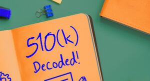 Graphic of Notebook Labelled "510(k) Decoded!"